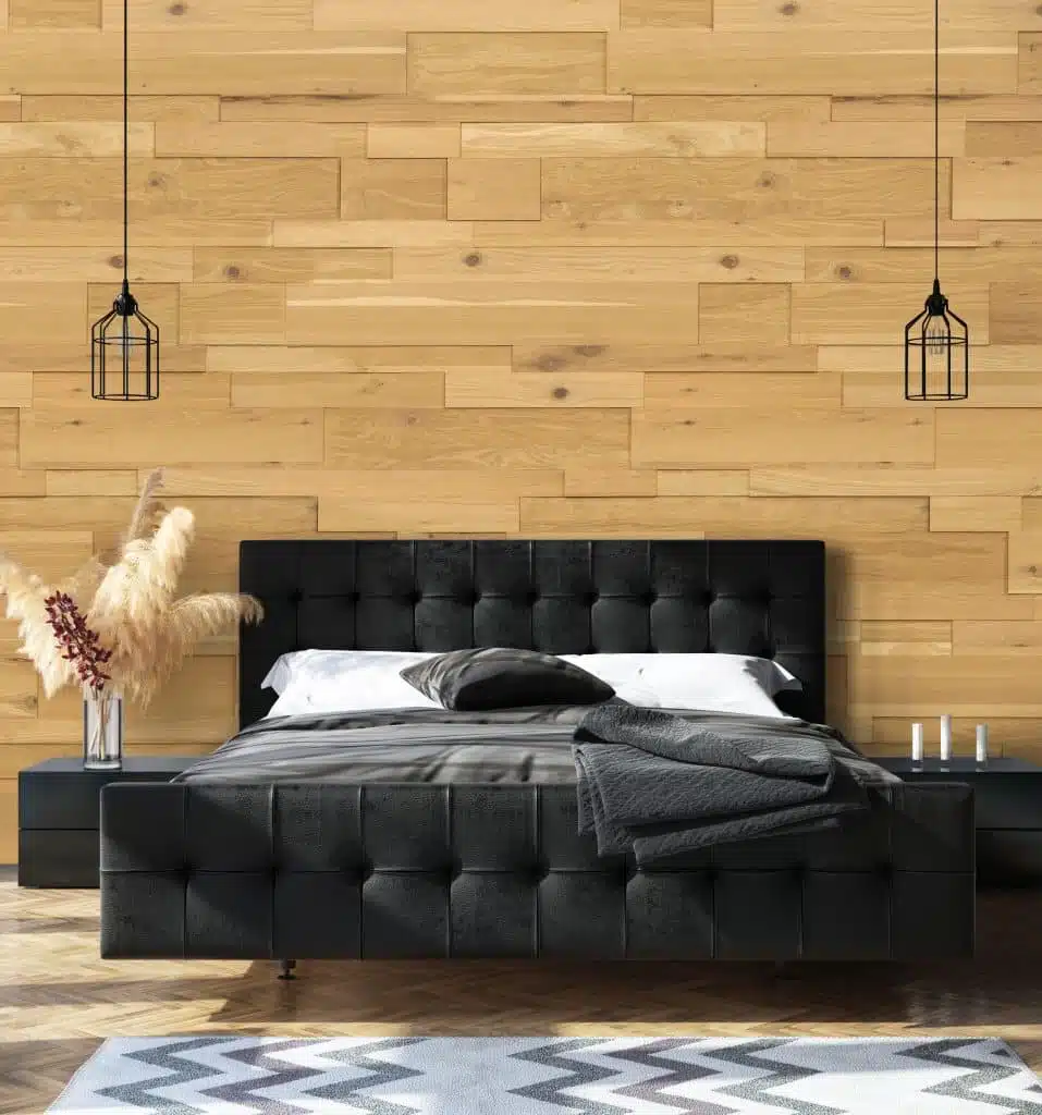 mur en bois avec un lit noir